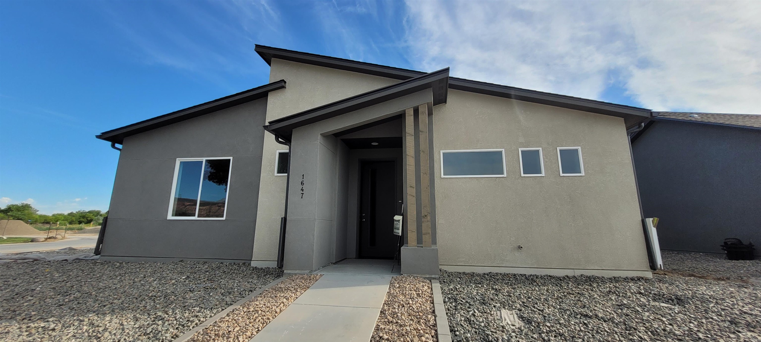 Welcome to Iron Wheel subdivision where affordability meets function! Brand new home with 1% closing costs through Seller's preferred lender (call for details). This one-of-a-kind community will have a wide variety of home types and sizes, a walking path to FMHS & easy access to both GJ & Fruita. Pricing includes xeriscaping & fencing. These well-planned homes offer maximum functional use of space, durable yet beautiful finishes & cute outdoor living spaces that require minimal maintenance. This property is next to the green area & retention pond. BUYER MAY HAVE TILE & FRONT DOOR COLOR OPTIONS, DEPENDING ON WHEN CONTRACTED. - Our Builder Advantage program can help you get 1% in closing costs through sellers preferred lender. Call for details. ESTIMATED COMPLETION  7/24/23