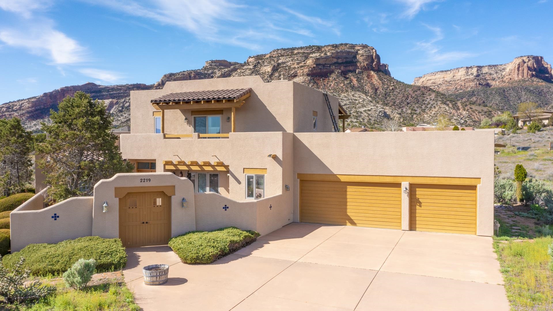 Beautiful Custom Southwest Style home at the base of Colorado National Monument!! The wonderful home features 4 beds, 4 baths, 3 car garage & just over 2700 sq ft of living space. You will love the custom ceilings in the living room, spacious family room off of the kitchen with access to the covered back patio w/ pergola & the formal dining w/ access to a second covered patio! Large master suite on the upper level w/ 5 pc bath, walk in closet & great deck w/ AMAZING Monument views. Additional bed/office upstairs w/ deck that has views of the Bookcliffs & a private bath. 2 additional beds w/ Jack & Jill bath finish out this lovely home. Did I mention the cozy enclosed front courtyard that would be great for morning coffee or evening wine!! Close to hiking/biking & walking trails!! You really need to check this one out!!