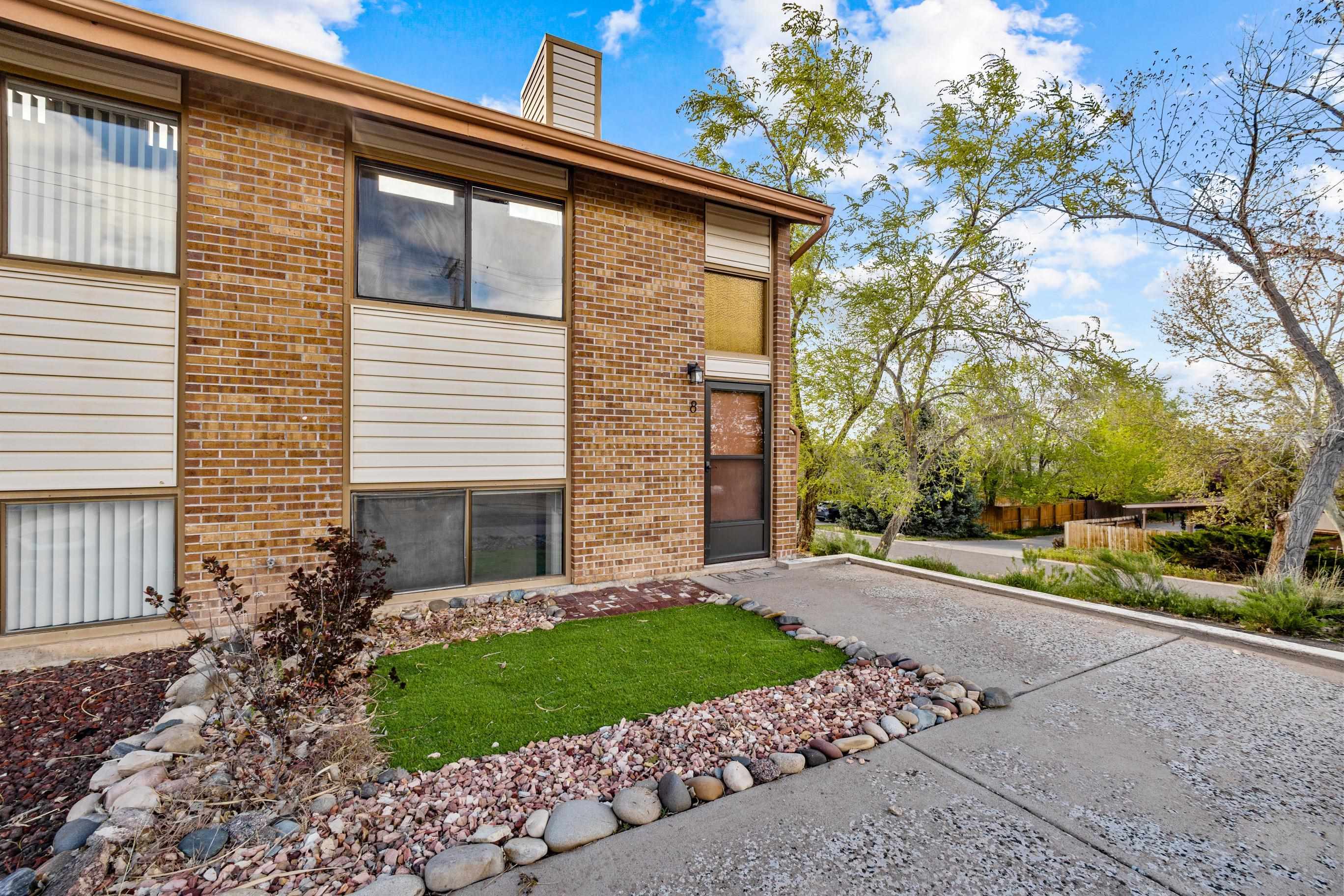 Are you Ready for Maintenance-free living combined with breathtaking views of the Grand Valley and convenient access to golfing, hiking, and mountain biking?   Located just off Tiara Rado Golf Course (4 min walk), this condo features an open concept main floor with high vaulted ceilings and clerestory windows which add to the natural light flowing into the space.  Luxury Plank Vinyl flooring spans throughout the upper floor, and newer paint adds a crisp feel throughout. Formica counters and a upper floor powder room are additional bonuses on this level. Downstairs, two sizeable bedrooms with great closet space are set aside the full bathroom with its double sink vanity. A convenient laundry room downstairs makes the job easy, and access to the covered carport from the master bedroom makes access a breeze.  Relax on your rear rooftop patio and enjoy the beauty right outside your door !!!  Buyer(s) & Agent(s) to verify all information