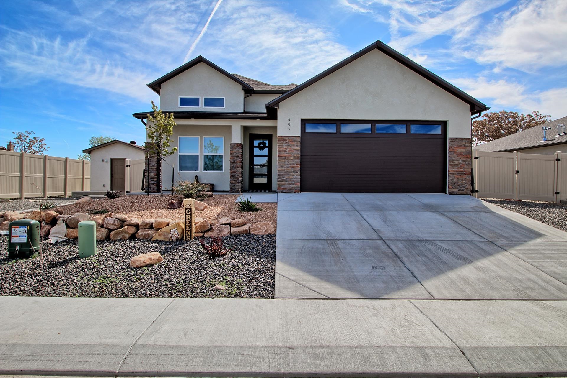 Beautiful Stucco Home built in 2022. Better than new! Fully landscaped and fenced with PVC fencing. 3 bedrooms, 2 bath, 2 car garage. Open concept with vaulted ceilings. Kitchen has granite counter tops, island, gas stove and all stainless appliances are just a few of the beautiful features of this gorgeously done home.1-4 pc bath in primary bedroom with a walk-in shower. House sits at end of street therefore you won't have much traffic. Patio is on the east side so great for morning coffee and evenings in the shade. Brand new shed stays. Come check it out! You will fall in love!