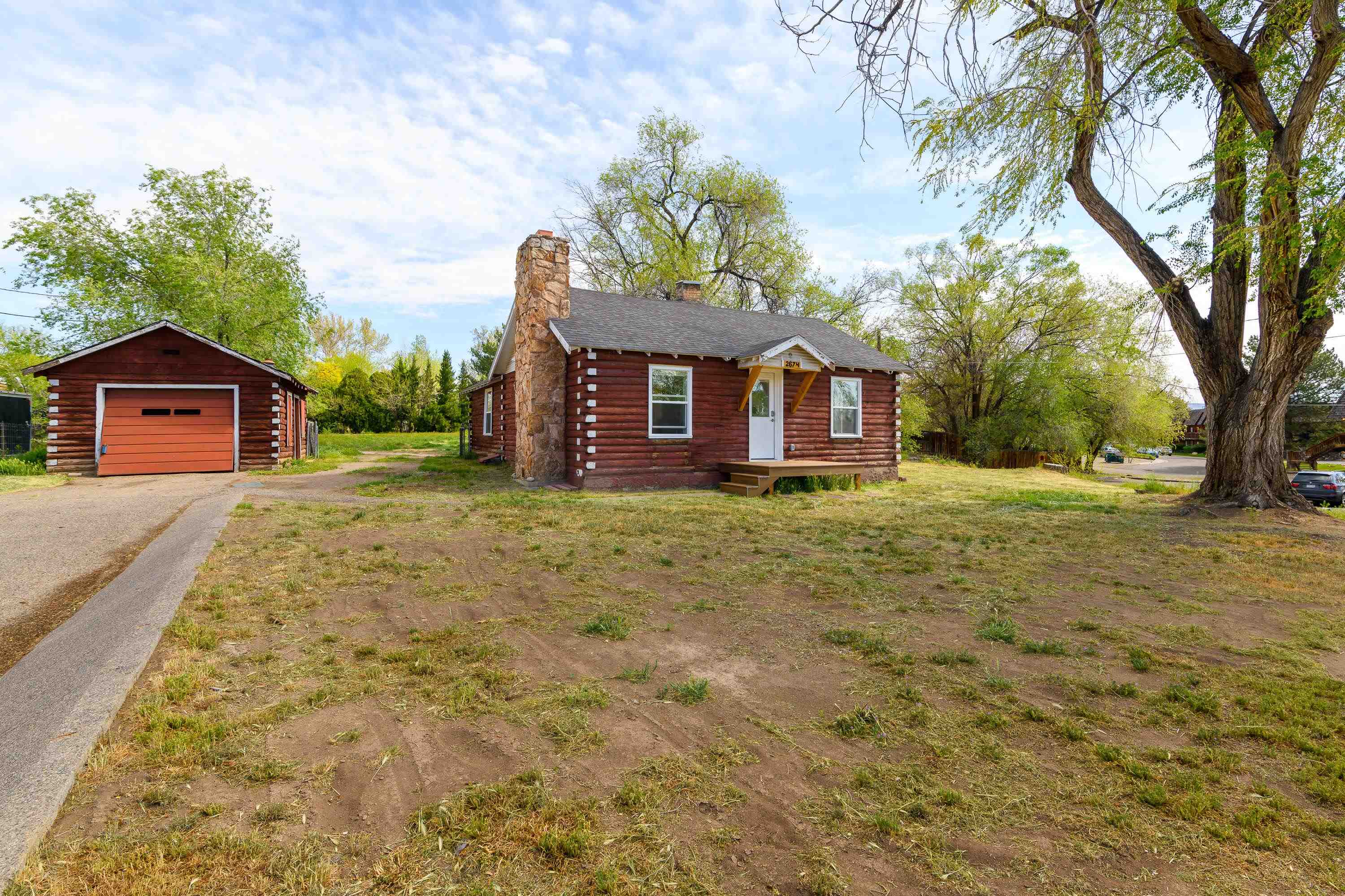 This one is small BUT mighty and sits on a really nicely sized piece of ground that has more options than you can shake a stick at!  This vintage cabin has been completely remodeled from head to toe, this place can easily transition from a single family residence, residential rental, vacation home or rental or business/office space - there are two private studio suites with their own entrance, plus a shared kitchen, dining area and laundry. On .63/acre, there is a ton of potential. Zoning is residential-office.  This is urban living at its best!  Conveniently located near bus stops, grocery stores, banking, restaurants and a short 5 min drive from the airport!  Book your private showing today.