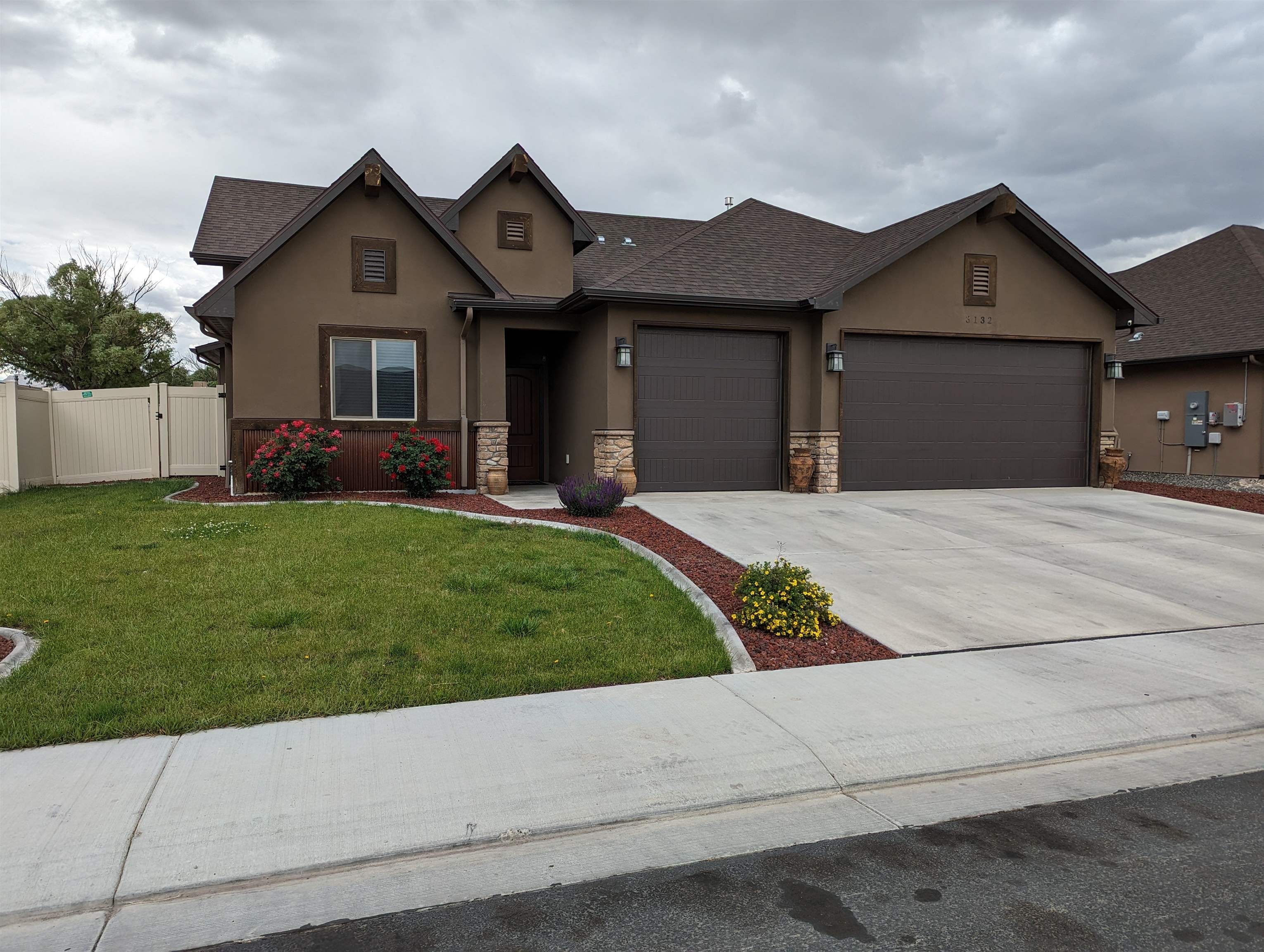 Absolutely beautiful home located in a newer subdivision,  granite counters throughout, stainless appliances including the refrigerator and gas range, high vaulted ceilings in the great room.  Tiled showers in both baths.  Very open light and bright living area, large kitchen island and ample kitchen make this home perfect for entertaining.  large Walk-in closet and shower in Owner's Surite.   Wonderful 3-car garage plus RV parking.  Conveniently located within 5 minutes of City Market, many restaurants and Walmart Neighborhood Store.  Less than 10 minutes to Walmart Super Center.  Shed in back yard is excluded. Seller has exterior cameras with sound that will be operational during showings.  Please see 360 tour which will be posted by 6/3/2023.