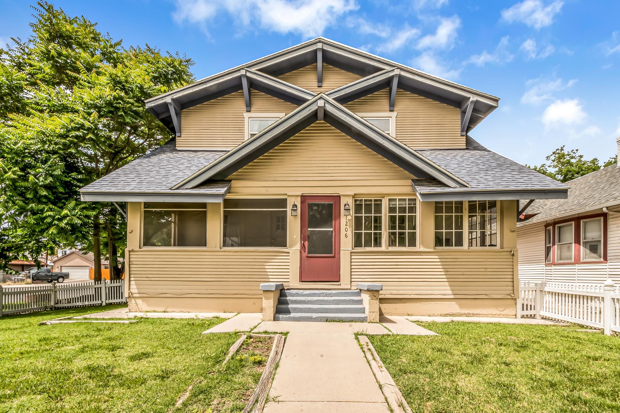 CUTE as a button 4 bedroom home PLUS a basement studio apartment AND BONUS full ADU makes for a FANTASTIC opportunity for single family or multi-family use located in the heart of Grand Junction's historical district, just minutes away from Colorado Mesa University, Lincoln Park Sports Complex and Pool, Stocker Stadium, and Main Street shops and entertainment! This stately home is adorable, from the full screened in porch, to the white picket fence out front! Carrying much of the original charm, including a brick fireplace and built-ins, it also features upgrades to the kitchen, flooring, bathrooms, and electrical service. Upstairs you'll find four bedrooms and a full bath, while on the main floor, you'll find the living, kitchen, dining, and bath. Head downstairs for a fully functioning, finished, studio basement space with its own separate entrance, bathroom, and kitchenette. Across the drive, you'll find a separate, detached 2 bedroom, 1 bath ADU home, all currently holding tenants on either month to month or have leases ending soon for those who want to utilize all of the spaces for themselves! This is an investor or multi-family dream opportunity! Don't miss out!