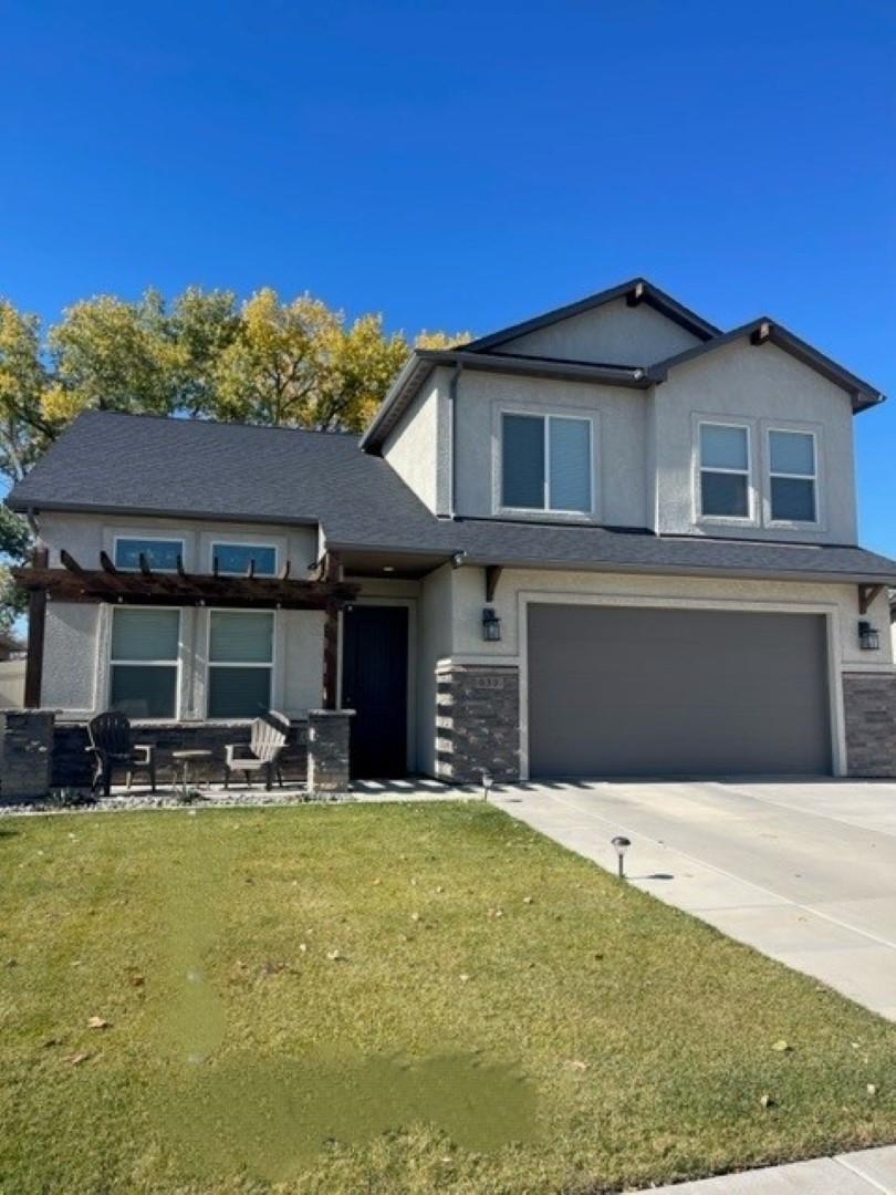 This home checks all the boxes! Beautiful, well taken care of, upgraded finishes, and an open concept! This home has 4 Bedrooms, 2½ Baths, and a 2 car garage with a bonus storage area. The primary bedroom suite, laundry room and living areas are conveniently located on the main floor.  Abundant natural light throughout, the lot backs up to open space and has monument views! There are mature trees bordering the back side of property offering plenty of shade on the lovely extended patio/ fire-pit area. Centrally located close to shopping, healthcare facilities and restaurants!