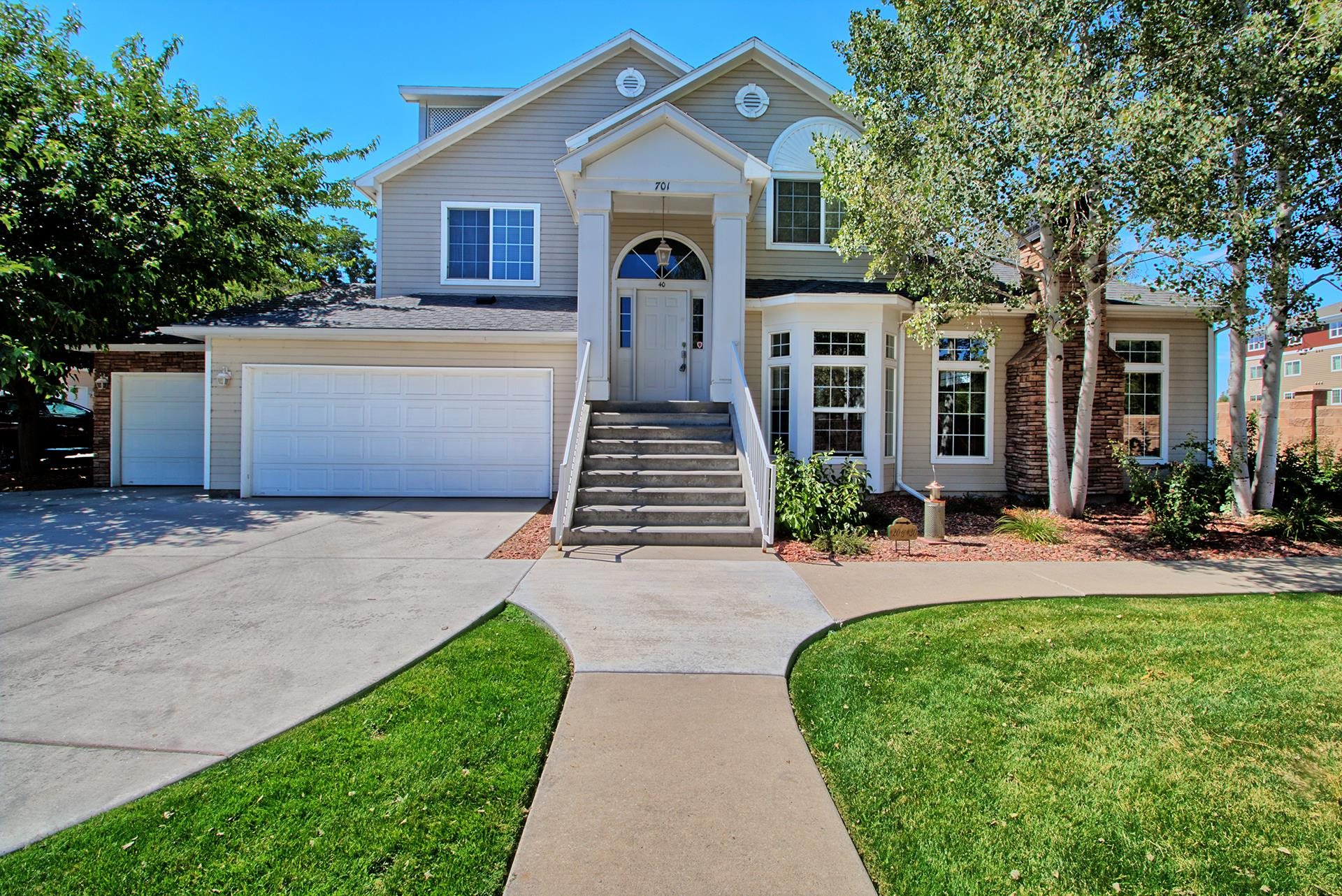 Conveniently located next to St. Mary's Hospital, and just minutes from the mall and airport.  This unit has been remodeled with luxury vinyl plank flooring throughout the main level living plus new carpet in the large 2 bedrooms and luxury vinyl tile in both bathrooms.  Spotless and ready for immediate occupancy.  Spacious, open concept with vaulted ceilings in the living room plus gas fireplace and balcony that looks towards the Monument.  Master suite has double vanities, large corner tub w/tile deck and large walk-in closet.  Attached is a 2-car garage where stairs lead up to where all the bedrooms, baths and living areas are.  Lots of natural light, great location and in great​​‌​​​​‌​​‌‌​‌‌‌​​‌‌​‌‌‌​​‌‌​‌‌‌ condition.