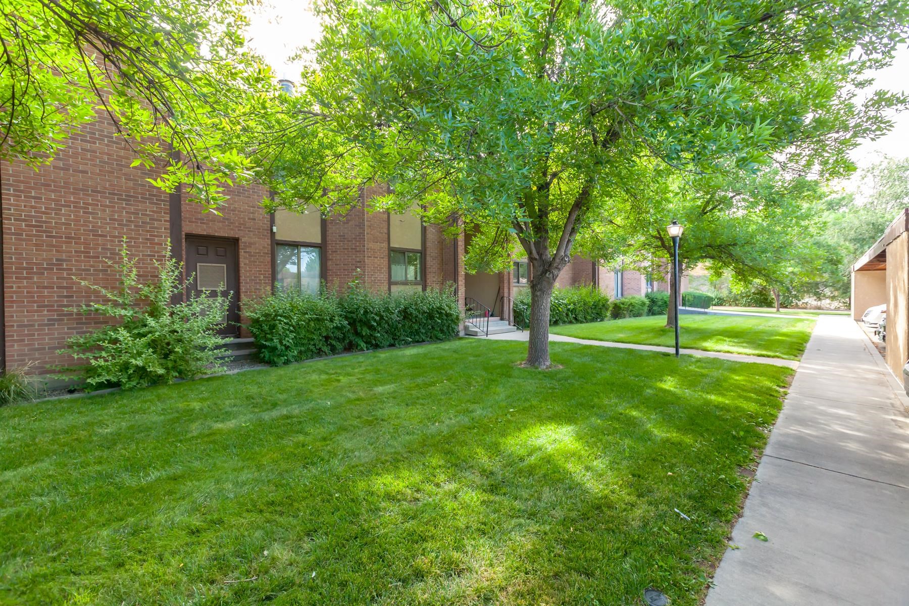 Floor level condo in well cared for complex, includes covered parking space. Sliding door to back patio and shared grassy area. Both bedrooms have a private bath, one a 3/4 bath and the other a full bath. Condo is ready for personal touches and updates or move right in and start to enjoy community living. All appliances, including clothes washer and dryer, stay with the property. The HOA takes responsibility for all exterior maintenance, common areas, lawn and grounds care, trash pick-up and sewer.
