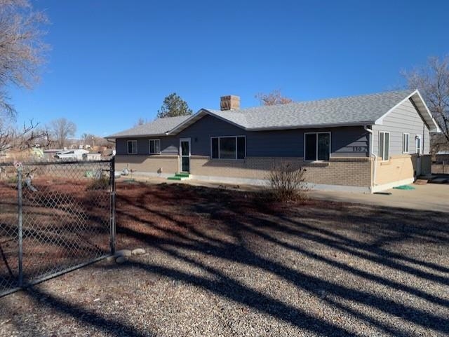 Country living on 1.37 acres!  Solid ranch style home with a detached 2 car garage.  Home features a newer roof, no maintenance siding, newer furnace, water heater and evaporative cooler.  Appliances have been updated.  Open concept kitchen (with seating bar) open to family room, separate living and dining room.  Area around the home is fenced.  Plenty of space for toys, RV's etc.
