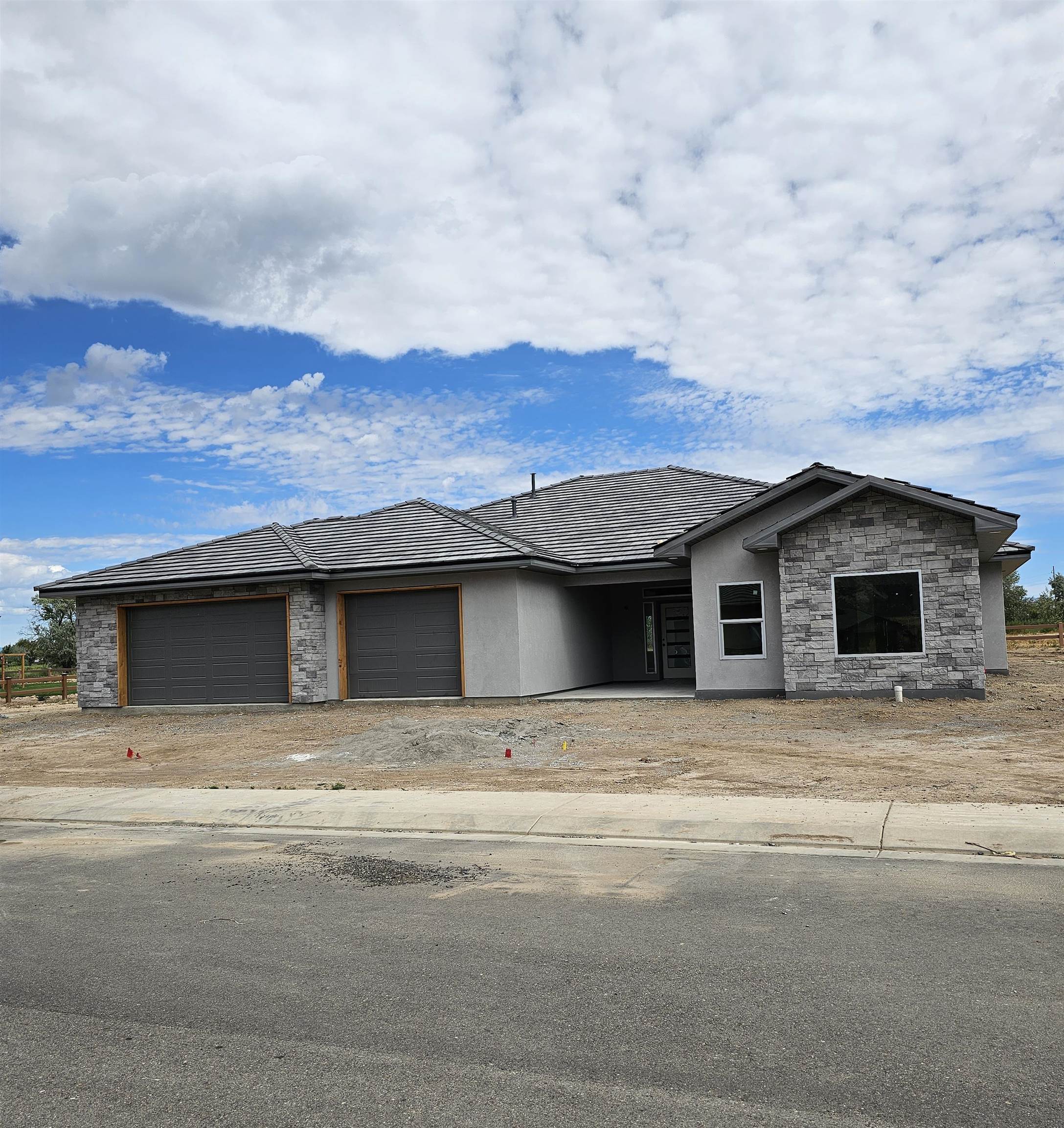 Pending before print. This spectacular new home is under construction with completion November 1st.  It sits on .45 acres which back to the Adobe Creek Golf course and has amazing views. There are numerous upgrades. See Builder Spec sheet in MLS Docs.
