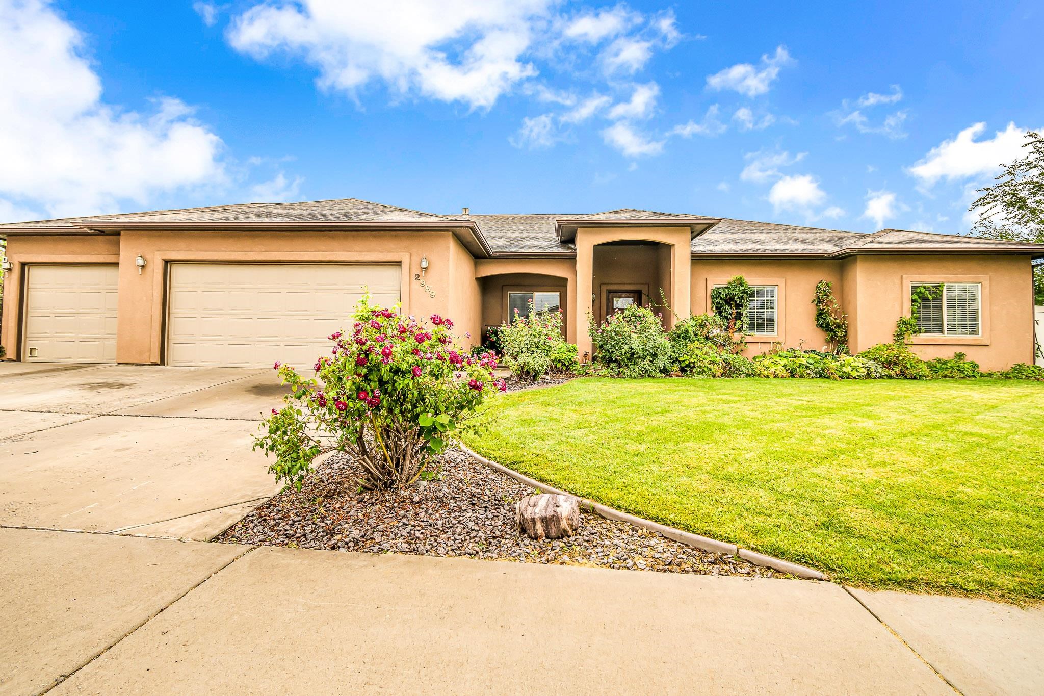 GRAND BEAUTY!  This remarkable 4 bedroom + Office Ranch-style home with CENTRAL AIR and oversized 3-car garage will blow you over!  From the gorgeous rose-lined walkup and covered front patio to the entryway of utter grand delight, this property will impress while also making you feel the warmness of home.  The great room will knock your socks off, not only by the impressive size, but also in how it will make you feel.  This home combines grand spaciousness with the cozy feeling of home-sweet-home, and the enormous kitchen with vaulted ceilings and wrap-around bar can entertain lots of dazzled guests! With the fireplace going in the background for ultimate ambiance, you can fully enjoy life in the way you always dreamed!  Dining room area provides a large space for dinner parties galore!  Relax on your east-facing back patio overlooking your carefully landscaped backyard.  Four bedrooms PLUS a nice-sized office to meet all your needs!  Enjoy the 5-piece primary bath and spacious en-suite!  Oversized 3-car garage provides room for all your toys all sorts of possibilities!   Come home to the property you've been wanting!   Buyer to verify all info and measurements.