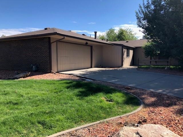 Ready for immediate Occupancy!  Nice single-level home on corner lot with mature landscaping.  Large living/Dining with vaulted ceiling. Garage has lots of cabinet storage and work/shop area.  10x20 screened in porch adjoining fenced rear yard/patio.