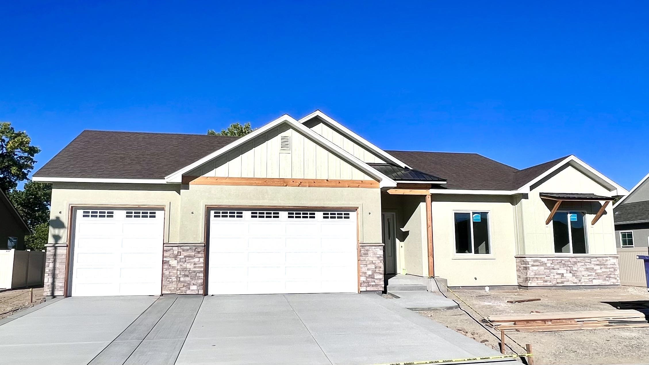 This stunning new build is a MUST SEE! Located in the desirable Orchard Ridge subdivision just minutes from downtown Fruita.  Spacious lot with room for RV parking, backing to open field bordered with mature trees. Boasting a wonderful 4 bedroom, 3 bath floorplan with beautiful custom finishes. Extra tall ceilings and doors throughout, along with  9' Garage doors to accommodate large trucks and cars.  This home is also heated with the new, wonderfully efficient, Heat Recovery System.   All information is subject to change/error without notice. Buyer(s) to verify all.