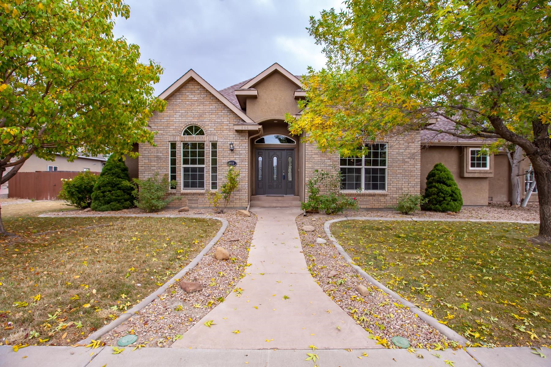 Enjoy all this property has to offer: in-ground pool, hot tub, 3 car garage,  4 bedrooms plus upstairs bonus room, and much more. Split floor plan with open kitchen area and formal dining room. Fantastic location in lovely northern Grand Junction. Wonderful opportunities for views along side the peace and quiet. Ample storage and plenty of yard space on this spacious corner lot.