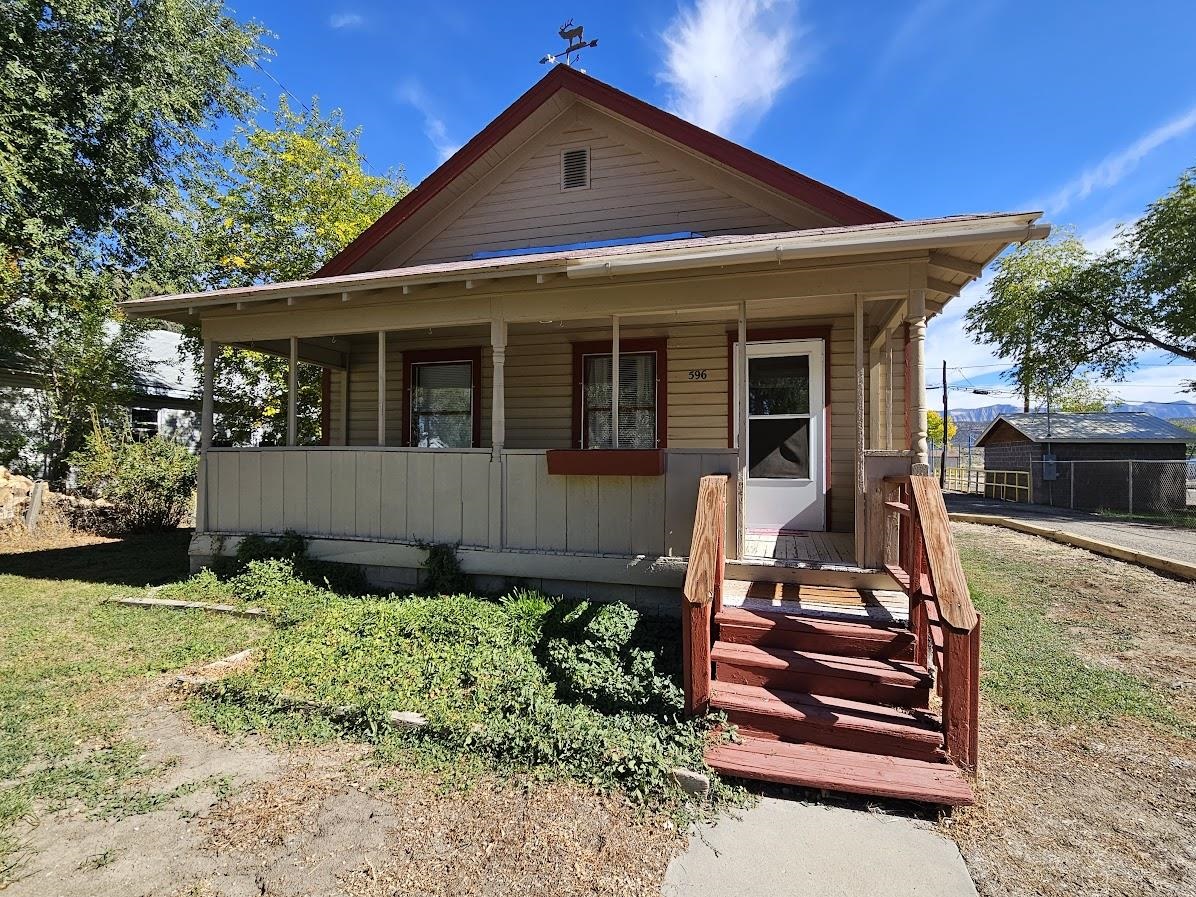 Check out this cute 2 bed 1 bath home on a large lot that sits next to the park in Debeque.  This property has an RV parking area to park your toys plus a large detached 2 car garage.  Enjoy evenings on your covered front porch.   This one is move in ready!!