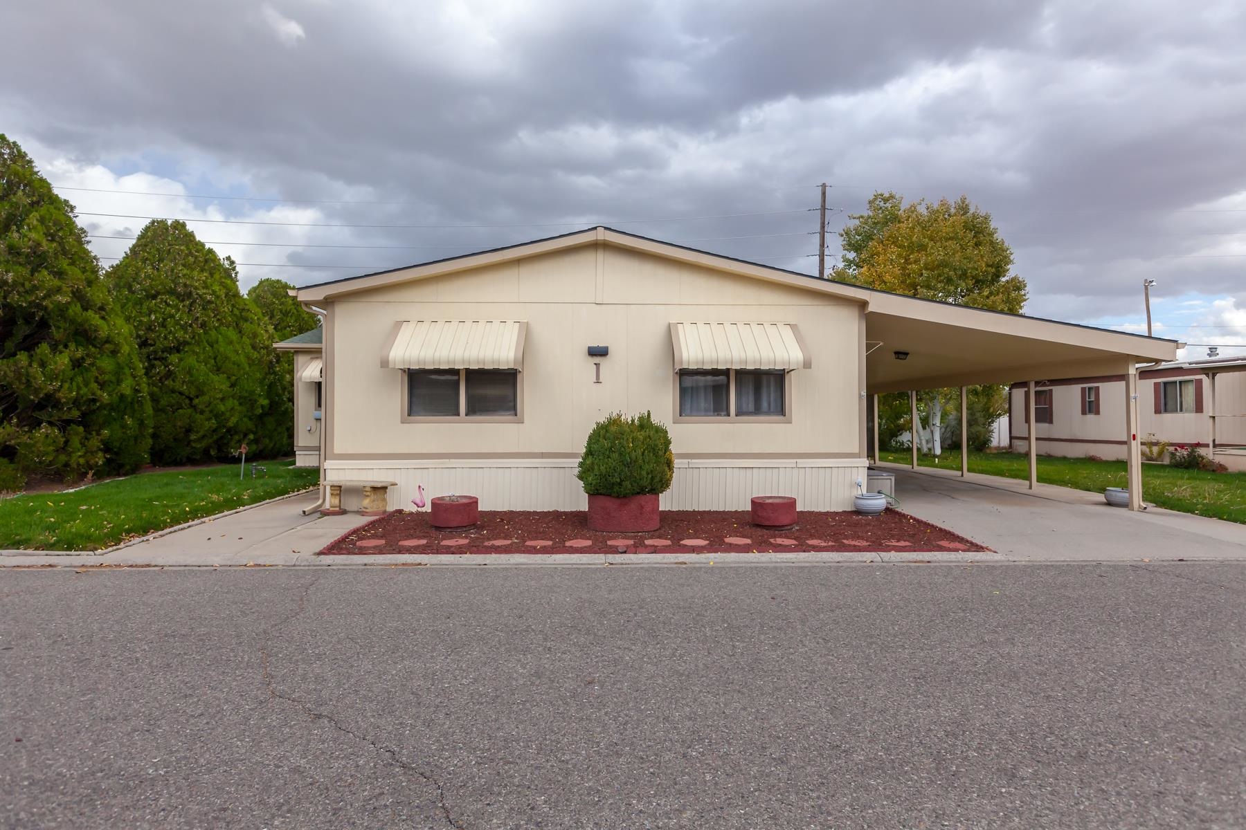 Roof and 5 skylights replaced in March 2008. Water piping under house replaced in July 2022 and water heater replaced in 2022. 4 bedrooms, 2 baths, 2325 sqft, with living room and family room. House has tie downs and working on obtaining an affidavit of real property. Champion 1988 28x45. 55+ neighborhood. HOA fees $125/month covers irrigation water, sewer, street lights, and common area maintenance. Shed that is included is stored in the HOA storage area for $15/month.