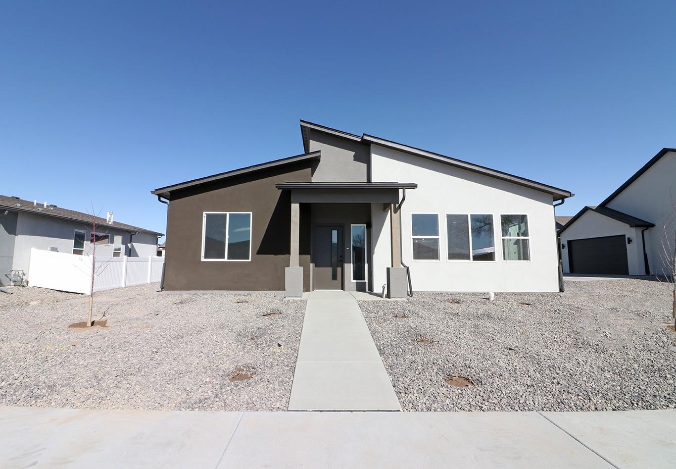 Welcome to Iron Wheel subdivision where affordability meets function! TWO UNIQUE AND CREATIVE PREFERRED LENDER OPTIONS THAT MAY SAVE YOU UP TO SEVERAL HUNDRED DOLLARS ON YOUR PAYMENT - NO GIMMICKS - CALL FOR DETAILS!   This one-of-a-kind community will have a wide variety of home types and sizes, a walking path to FMHS, neighborhood park & easy access to both Grand Junction & Fruita. Pricing includes xeriscaping & fencing. These well-planned homes offer maximum functional use of space, durable yet beautiful finishes & cute outdoor living spaces that require minimal maintenance. New Vertical floor plan with 3 bedrooms 2 baths & 2 Car garage. NO FINISH CHOICE OPTIONS AVAILABLE.  Estimated completion 12/18/2023