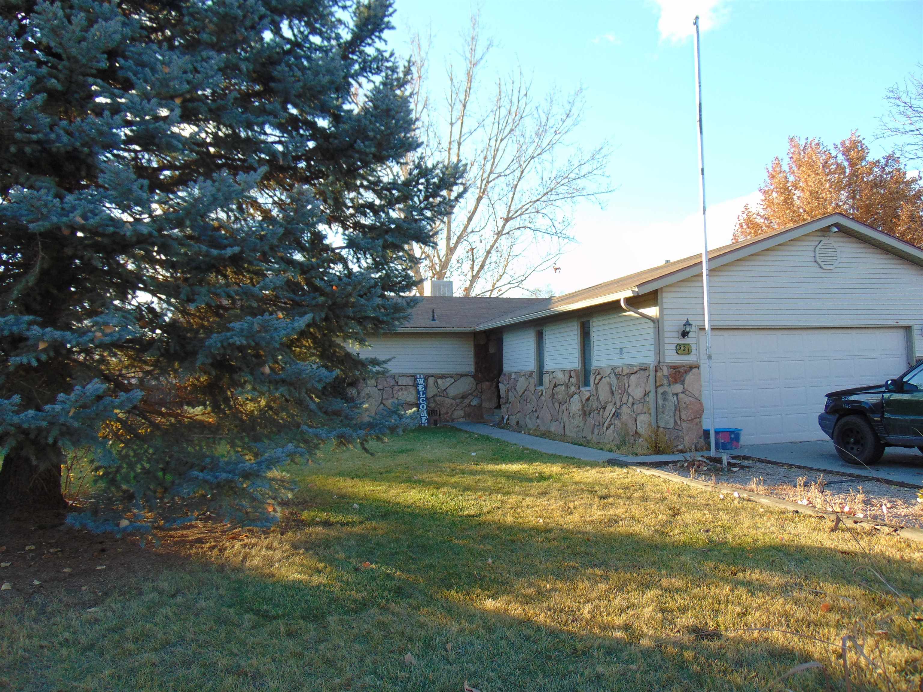 Welcome to Fruita!! Come check out this Fruita charmer. Featuring 3 bedrooms and 2 bathrooms. Close to downtown shopping, restaurants, concerts, schools and more! Large lot and backyard ready for a new owner to make it their own. Large shed for a hobby hut or extra storage. Cute chicken coop and dog run. Extra space for toys and RV Parking, this home really has it all. New flooring and paint throughout. Come check it out before it's gone.