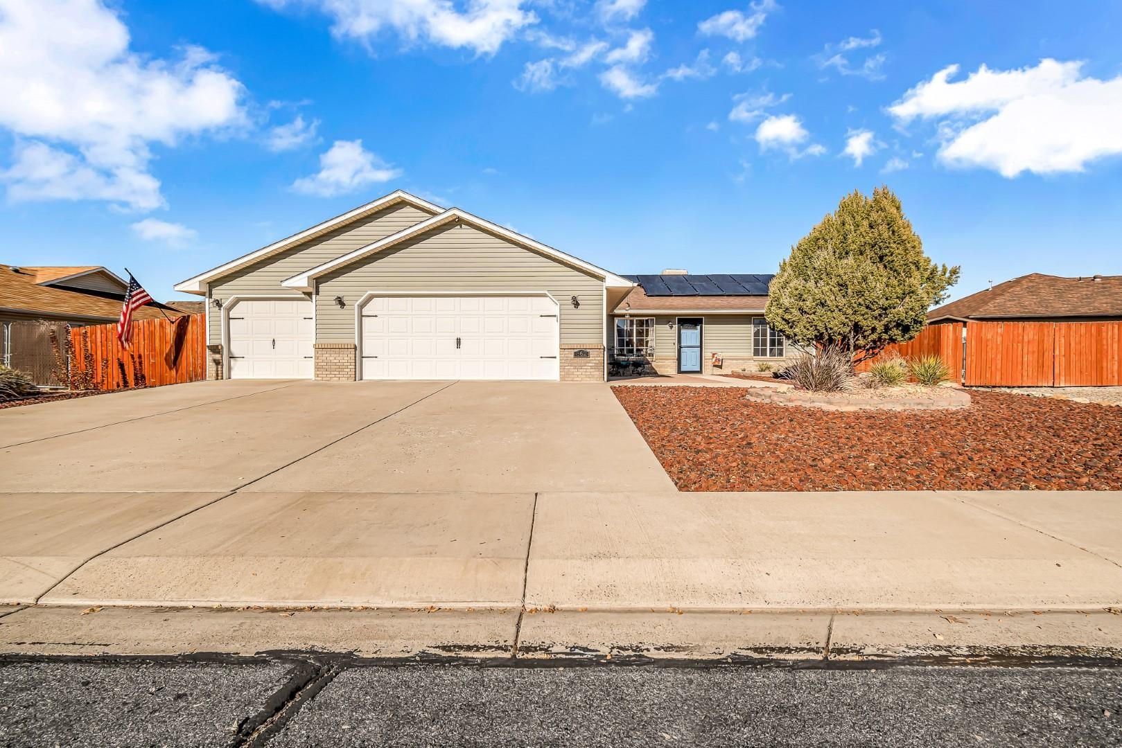 Come see this beautiful, well-taken care of 3 bed, 2 bath, 3 car garage home in Stone Mountain Estates! It has all the upgrades you could hope for with owned solar panels, a huge RV Parking area with hookups, Arlo security camera system, backyard shed for additional storage, pellet stove, Breeze Air Swamp Cooler, and even a radon mitigation system. It’s location is perfect as it’s close to downtown Fruita, mountain biking trails, hiking trails, the riverfront trail, and I-70 for convenient commuting. There is also a lovely park across the street and views of the Colorado National Monument. It has a fully xeriscaped front yard and a fully fenced and landscaped backyard with a Rainbird sprinkler system on irrigation water provided through the HOA. Schedule your showing and come see this beautiful home today!