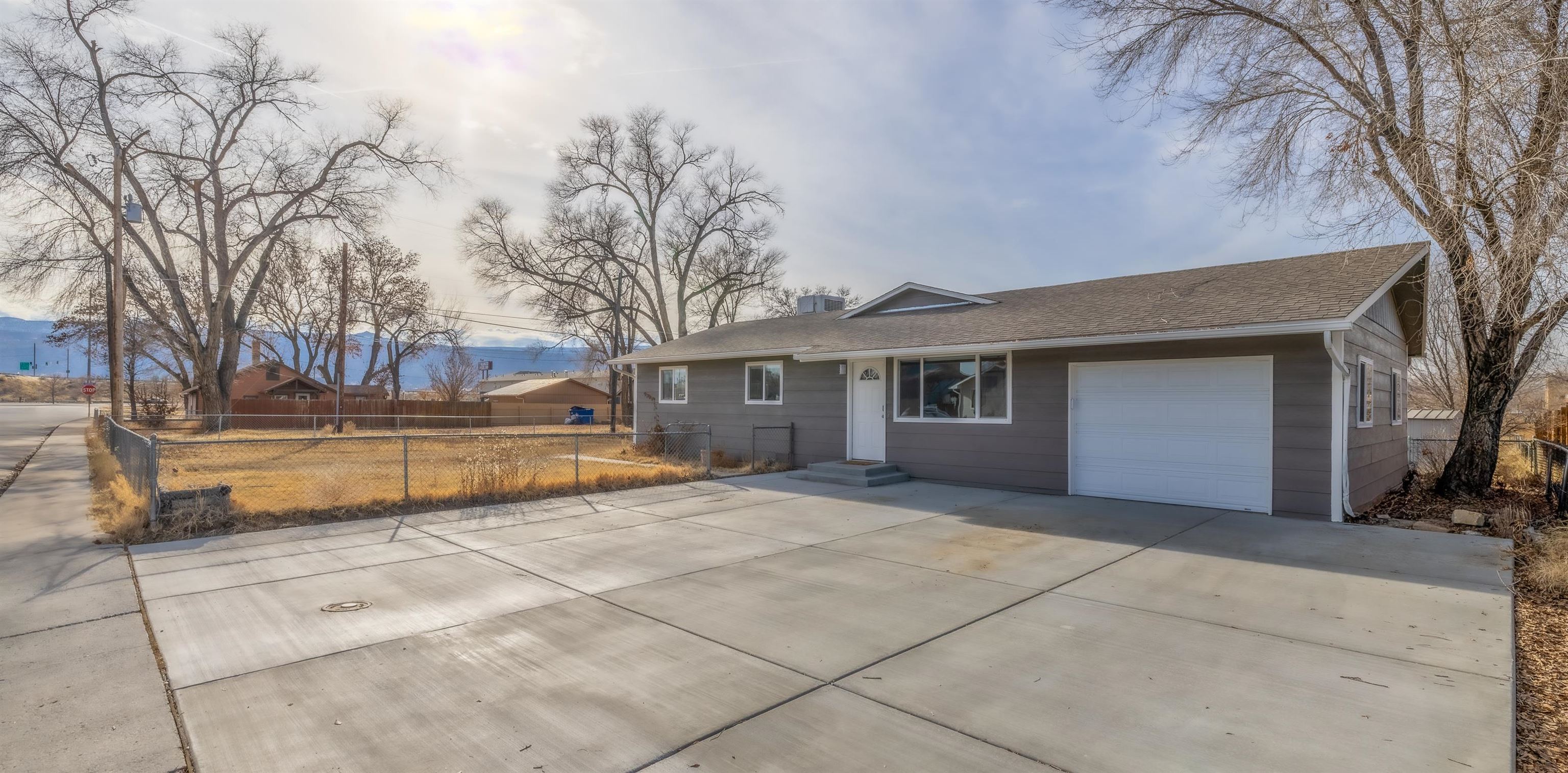 Unique opportunity to get a Multi-Use property in Fruita. Get inside this clean, bright well laid out home in Fruita, Colorado. It was fully remodeled in 2023 with new furnace & central air. Large custom gazebo in the backyard, storage throughout the home, with new paint, flooring and cabinets. It doesn't stop there though. This 4 Bed 2 Bath home sits on .36 acres with a mixed use zoning, near commercial and residential, providing lots of potential. There is room for animals, to grow your own food or build an ADU for additional income or the in-laws. Ready for the new owners or investor looking for rental income.