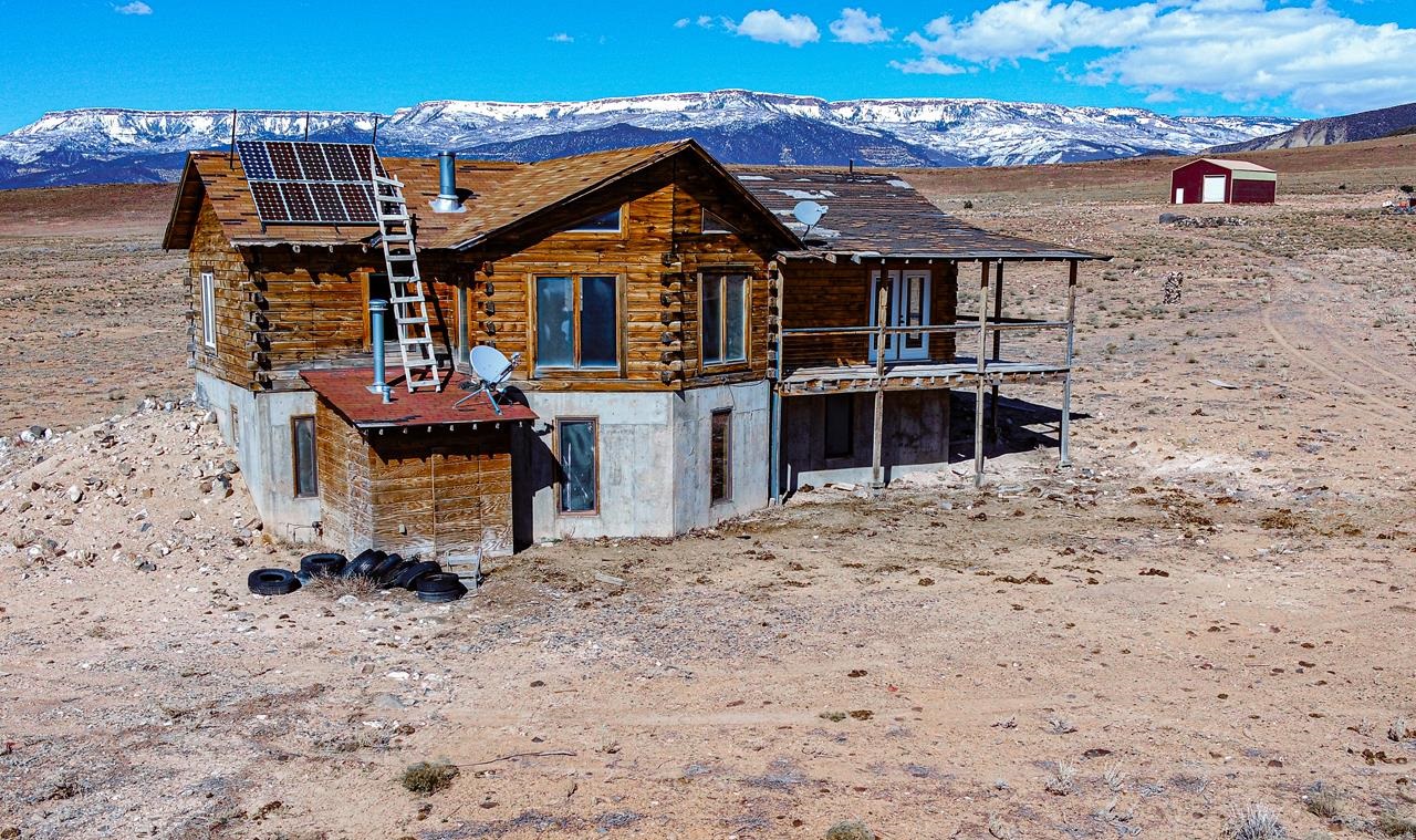 Back on the Market!! Looking for your private 40 acres oasis in Whitewater, Colorado? This property has everything you are looking for located just20 minutes from Grand Junction... 360 views, no neighbors in sight, completely off-grid and surrounded by BLM land. This is the perfect cabin for hunting or just to get away. The cabin needs to be completed, but wouldn't take much to finish it. Don't forget the 30x40 shop and the cabin has all utility hook-ups ready to be finished. Don't miss out on this slice of privacy, 4x4 and high clearance REQUIRED, call for more details!