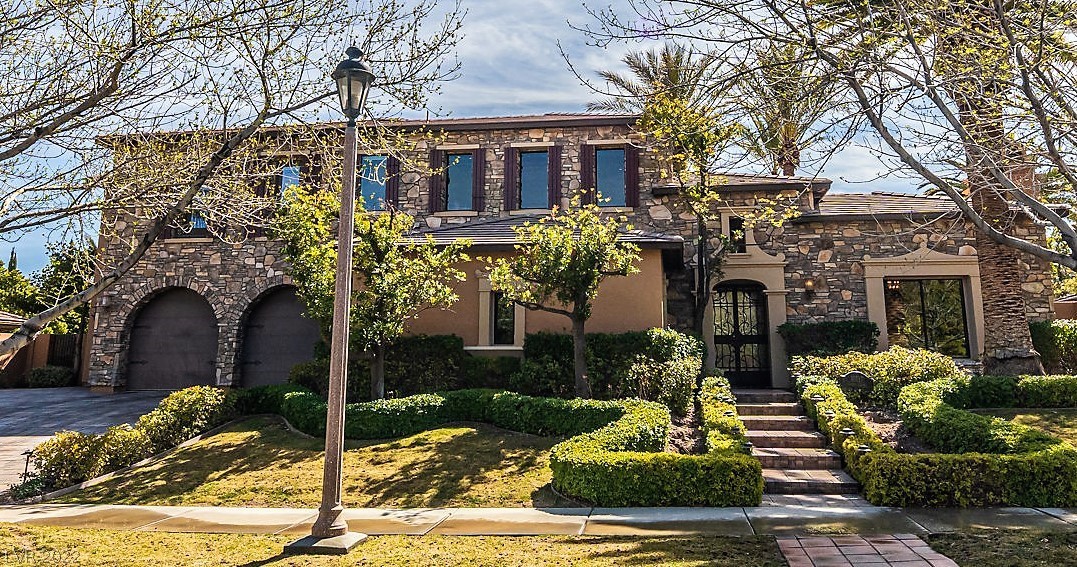 Majestic home perched on hill in heart of Summerlin.