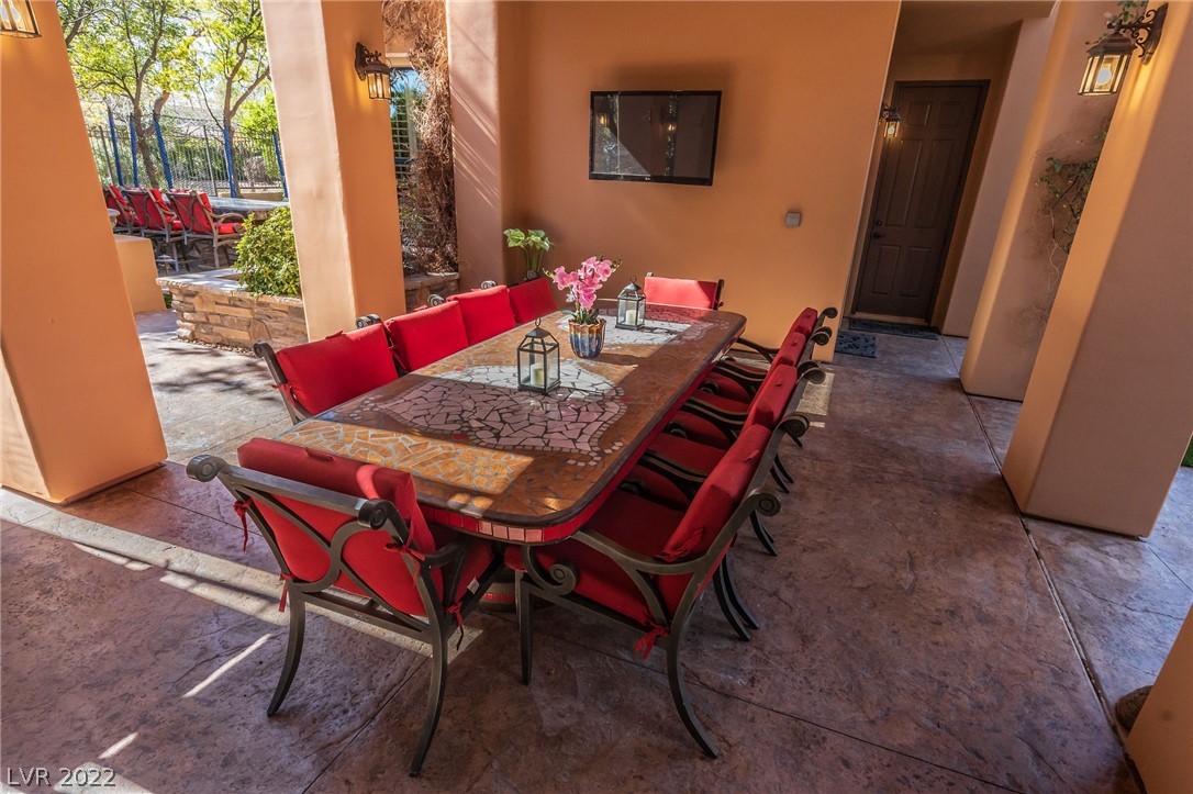 Covered dining patio located between main home and two casitas.