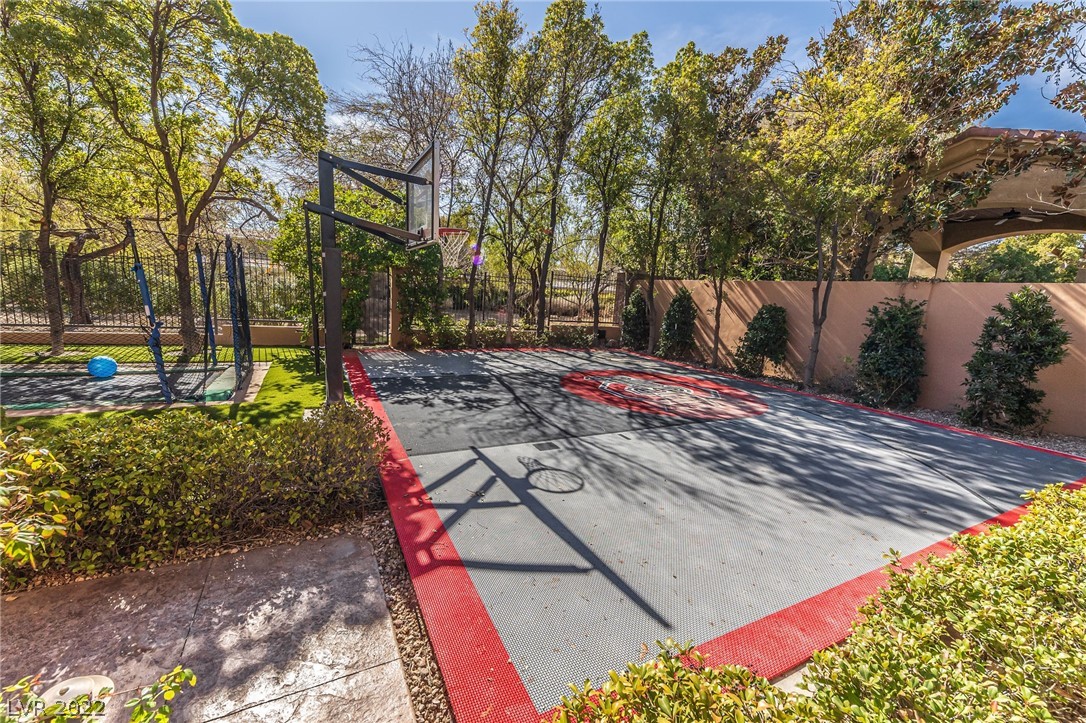 Basketball court, inground trampoline and mature landscaping.
