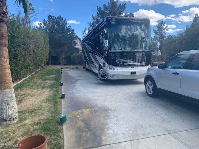Located in the 24 hour guard gated Las Vegas Motor Coach Resort, this beautiful north facing, nicely landscaped site is great as a blank canvas for a future buildout, or perfect just the way it is!  Offers plenty of privacy with no coach behind!