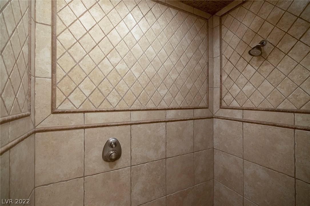 Photo #15 Fully tiled walk-in Primary Shower.