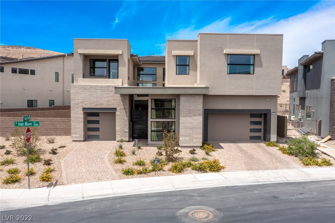 A fresh start for you and your family awaits at this two-story home in Mesa Ridge, a guard-gated community located in The Mesa Village of Summerlin.