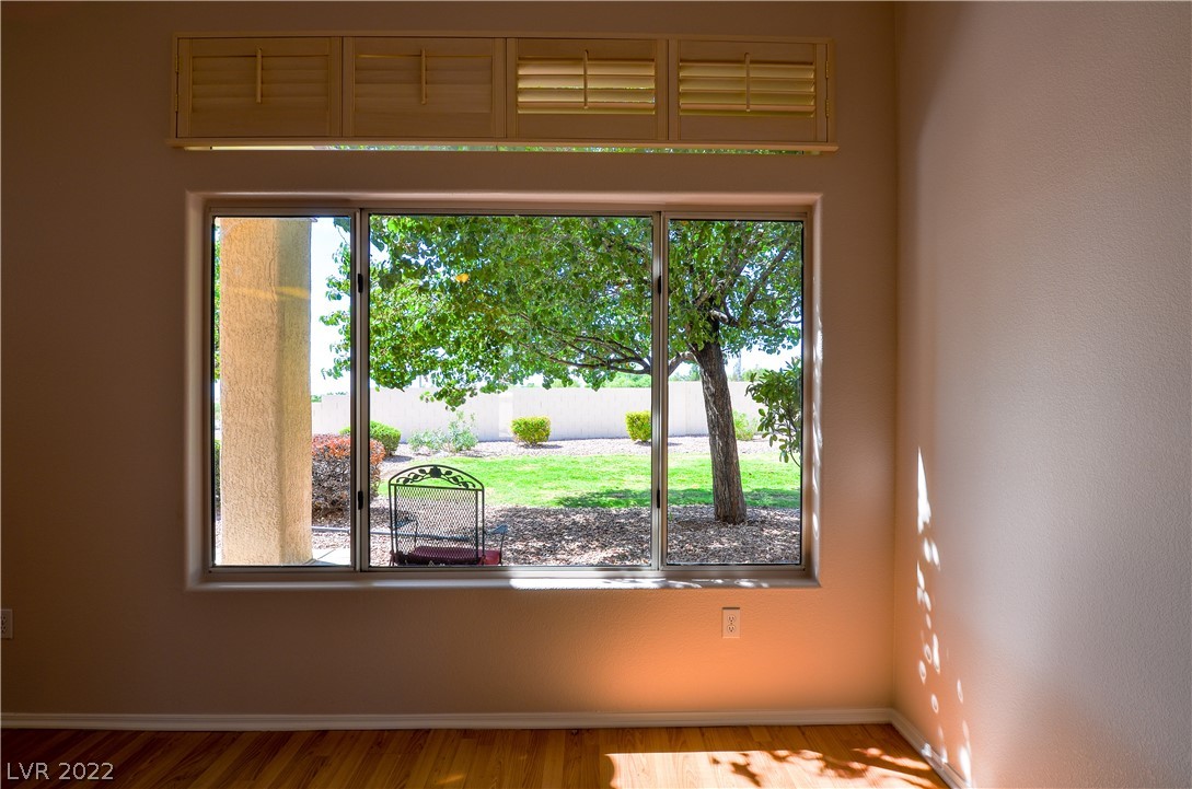 Photo #10 Living room windows offer great garden views and n