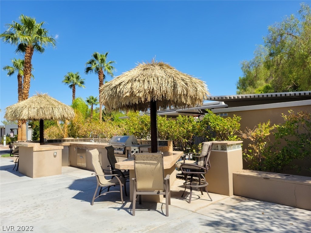 Located within the Class A Las Vegas Motorcoach Resort, this beautiful “Old Town”, north facing site has everything you need for outdoor entertaining. There are 2 palapas that shade a granite outdoor kitchen with barbeque, side burner, sink and more, with an array of seating options. There’s also plenty of storage.