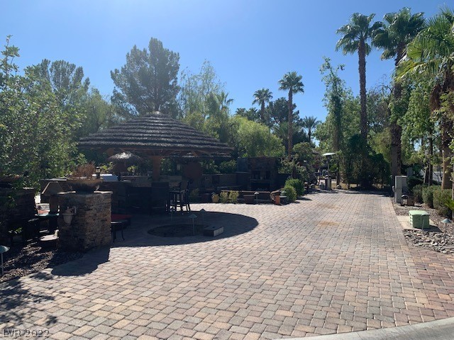 Located within the Class A Las Vegas Motorcoach Resort, this one of a kind over-sized corner site is an entertainer’s paradise with multiple seating areas, palapas, full kitchen, recessed living retreat with fire feature and TV, storage space and much more!