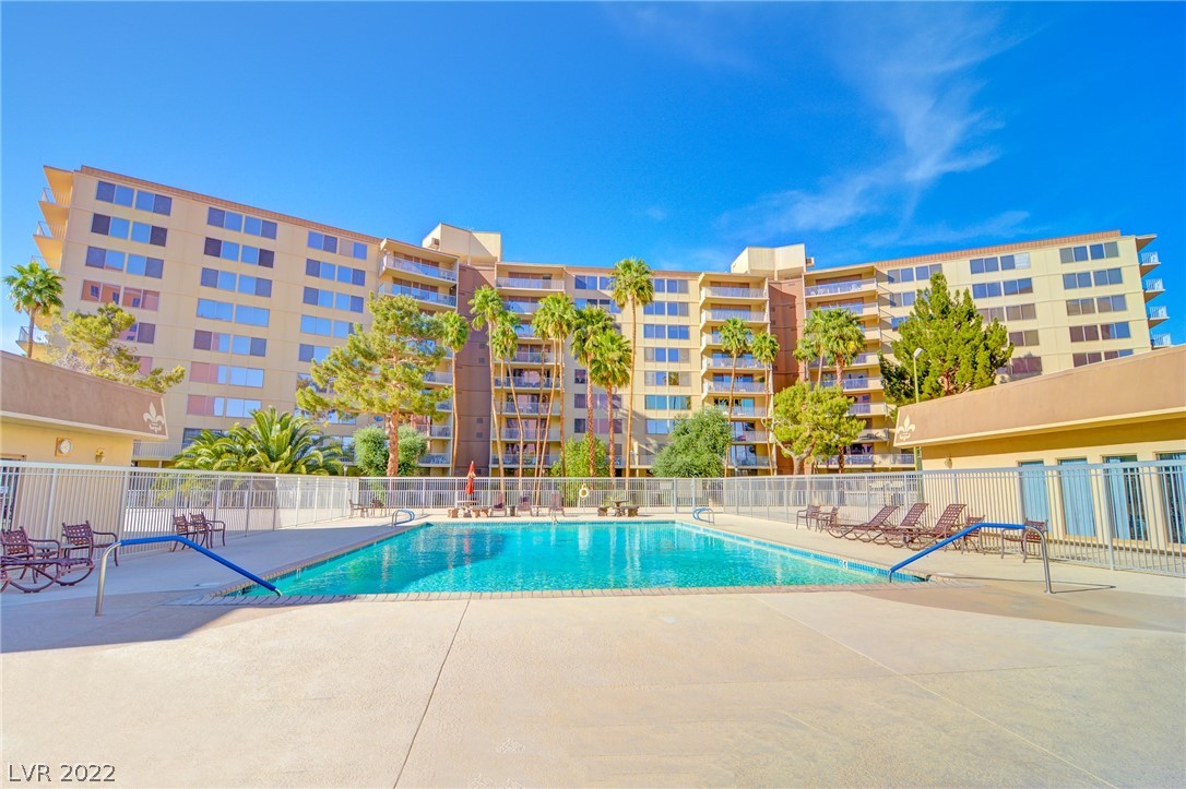 Directly Across From New F-1 Las Vegas Site. Amazing Location! Spacious corner unit. Under 10min walk to center of LV strip & close to Raiders stadium. Tile floors throughout. Upgraded kitchen & custom baths. Granite & s/steel. Strip & mountain views & huge balcony w/ kitchen access. Secure 24/7 guard & cameras. pool, spa, sauna, gym, clubhouse, bbq area, tennis courts, basketball area, etc. Building remodel almost complete. u/ground secure parking. avail. fully furnished