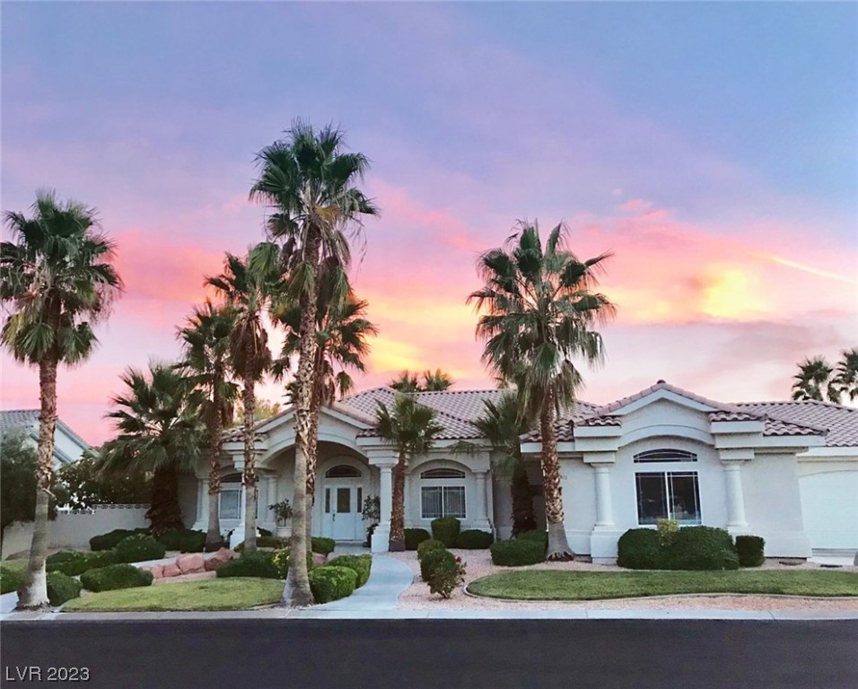 Gorgeous Luxury Home near the mountains of Las Vegas! Presenting 4 bedrooms--3 with ensuite baths and enormous primary suite overlooking your Custom Pool and Spa. The sound of trickling water outside your bedroom with private access from your Primary Suite. Huge RV Parking area on this 1/2 acre size lot, boasting Mature Landscaping and Fruit Trees. Located on a secluded Culdesac, but close enough to shopping and I95 and CR215. For gaming, hiking, skiing and more, by way of the  Las Vegas Strip or nearby Mt. Charleston & Lee Canyon Ski Resort. Also Red Rock Canyon National Recreation area. Grilling poolside and entertaining friends.. it's a lifestyle! This single story ranch-style beauty is what Las Vegas is famous for and won't last long at this price!