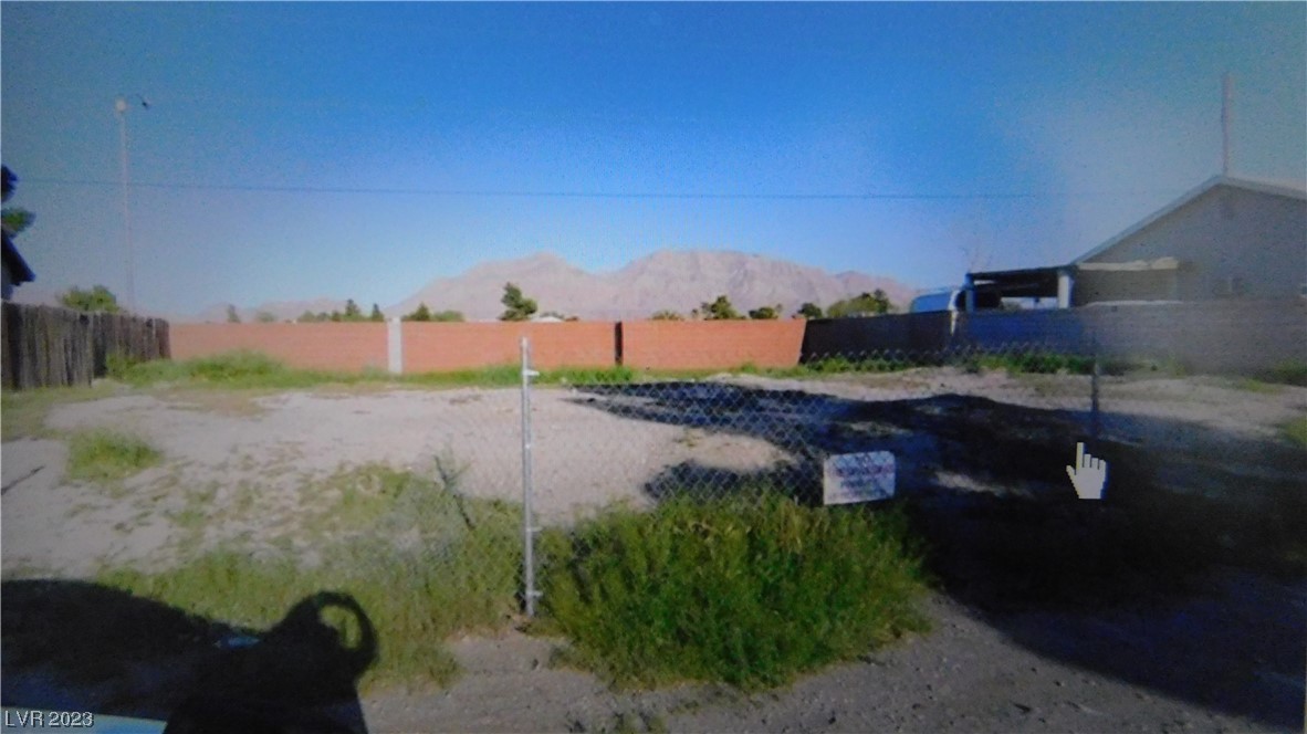 Single family lot 69x100  in established neighborhood power and water to property. Owner has some plans available.