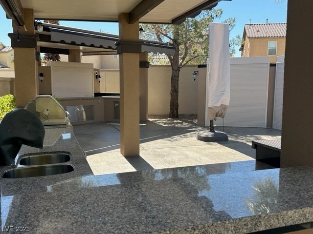 Located in the guard gated Las Vegas Motor Coach Resort, this amazing north facing site is right across from one of the satellite pools, restrooms, laundry, and more.  Featuring two hard roof structures w/granite counters, stainless steel appliances, living room area w/TV, storage sheds, epoxy driveway, privacy wall, and much more!