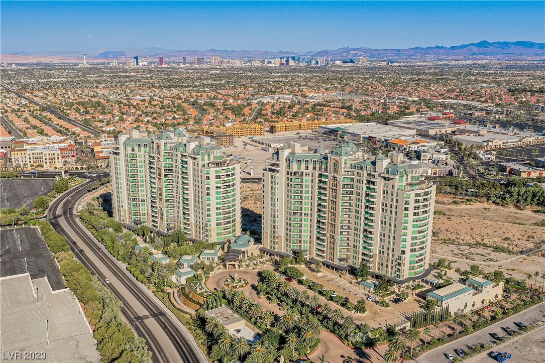 Renovated luxury condominium in highly amenitized, prestigious One Queensridge Towers. Premier 2 bed, 3 bath,+den, front corner unit, nearly 2,300 feet of living space with floor to ceiling windows, covered balcony providing unobstructed views of the City, the World famous Las Vegas Strip, lush courtyard, gardens directly below and beautiful Red Rock Canyon to the West. This bright, open layout is perfect for entertaining with a spacious Great room and kitchen. Primary suite features a walk-in-closet with en-suite bathroom featuring soaking spa tub & separate steam shower. Queensridge offers residents a variety of luxe amenities, including 24-7 security guards, concierge, complementary barista/breakfast service, indoor/outdoor swimming pools, fitness center, board room, theater, poker room, billiards/game room, wine cellar/lockers, valet/doorman, private spa w/sauna & treatment rooms. 2 car enclosed garage plus storage. Superb location, near restaurants, shops and entertainment venues.