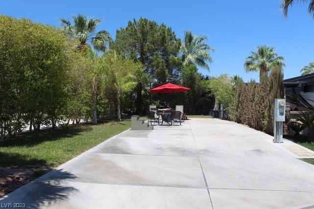 Located in the guard gated Las Vegas Motorcoach Resort, this beautiful site is south facing, private, and features lush landscaping including tall trees for privacy and plenty of green grass for those hot summer days!   Plenty of room for a future buildout as well!