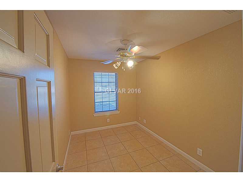 Den. Den area can be used as an office or for extra storage space. Tile floors & ceiling fan.