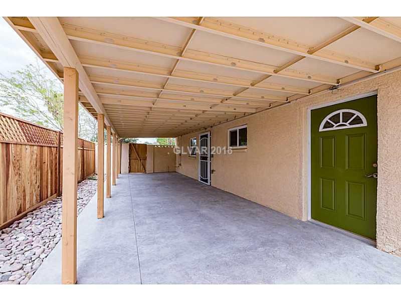 Property Photo. Side covered patio