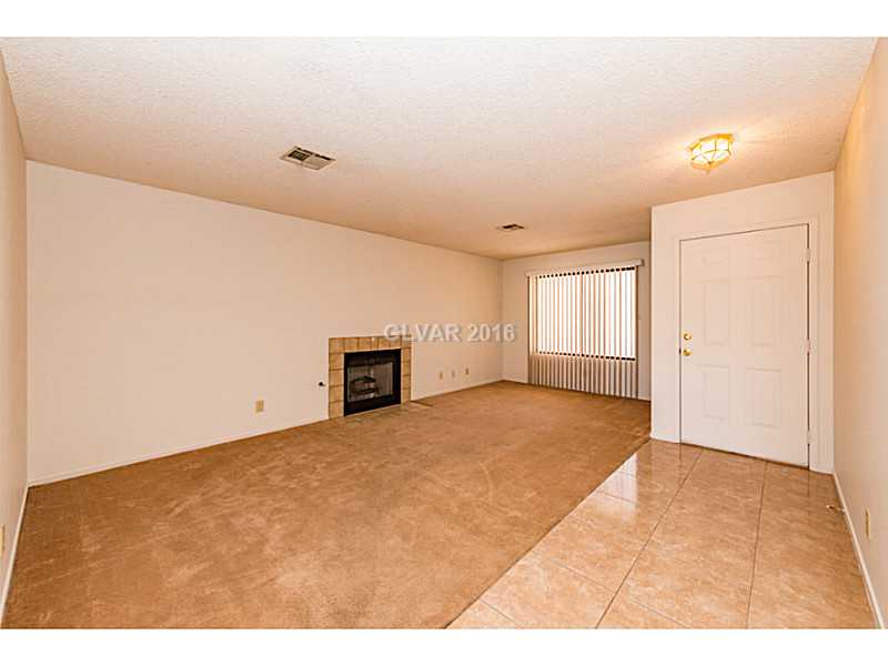 Property Photo. Large Living Room with gas fireplace