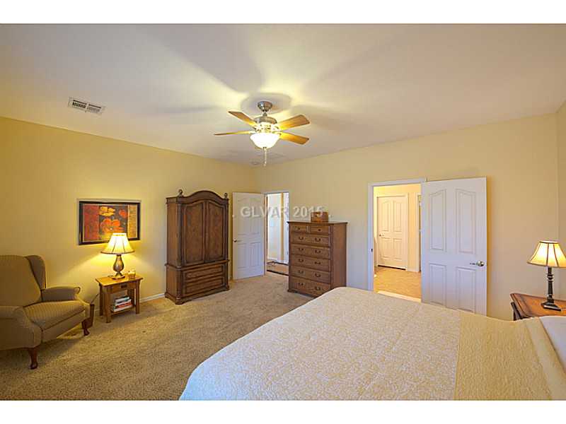 Master Bedroom. Large master bedroom offer plush upgraded carpet with upgraded padding.  Ceiling fan and lots of natural light, and direct access to master on-suite bath.