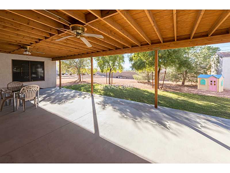 Exterior Back. Large covered patio with Las Vegas city & strip views & two ceiling fans for the warmer temp months.