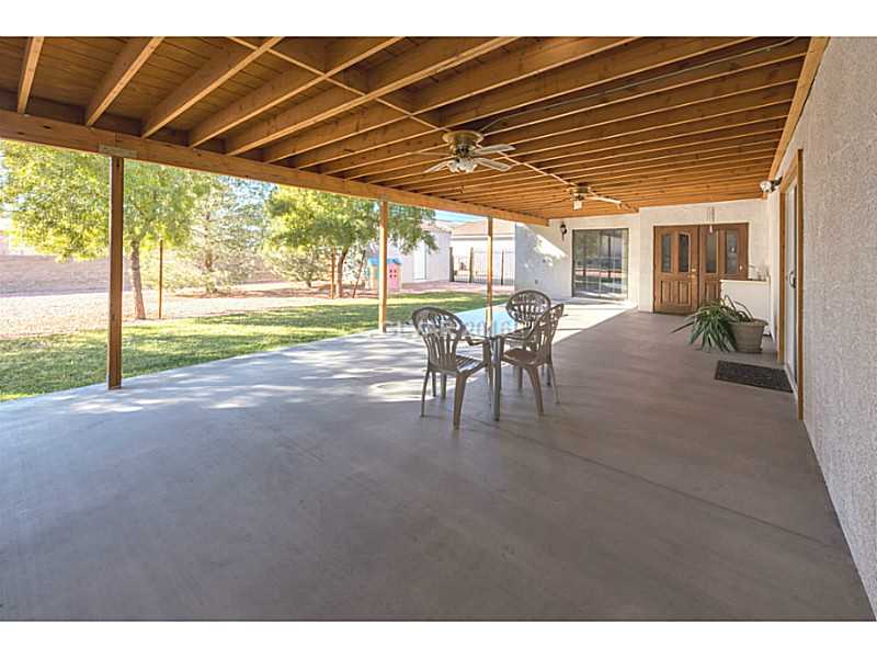 Exterior Back. Large covered patio with Las Vegas city & strip views & ceiling fans.