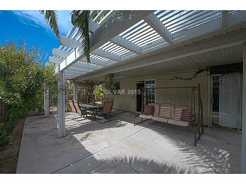 Yard/Garden. Backyard covered patio is accessible from family room & downstairs den.