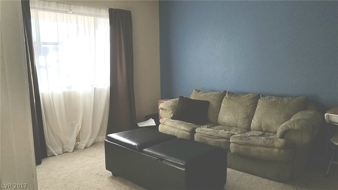 Spacious downstairs master is being used as a family room. It has a bathroom & walk-in closet.