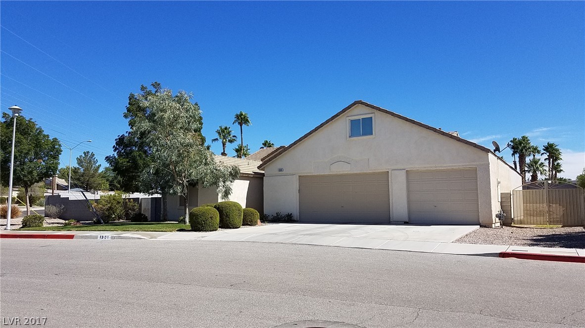 Step inside to a world of surprises!! 3900 square feet!! RV parking with dump on right.  Extra-deep garage has been added.  Ceilings raised.  Rooms are gigantic and lot is even bigger!!  You won't find another house like this one!