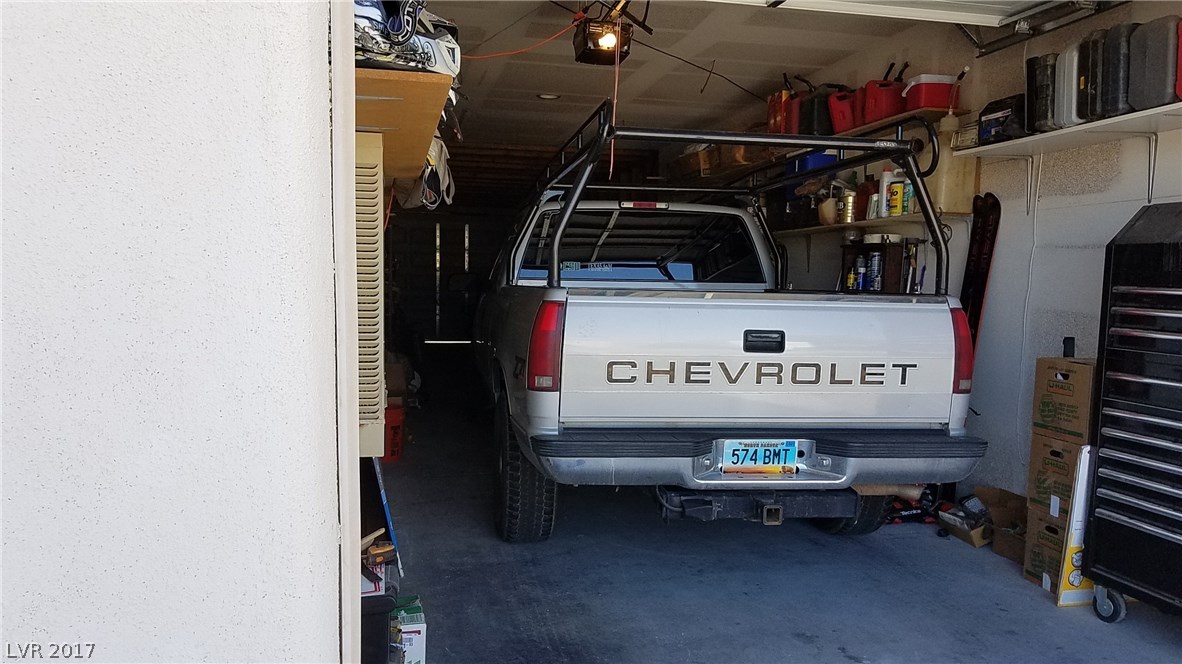 How about a garage that holds a full-sized pickup truck, and motorcycles, and tools, and bikes, and....you get the message.  60 feet deep with a door at each end!!