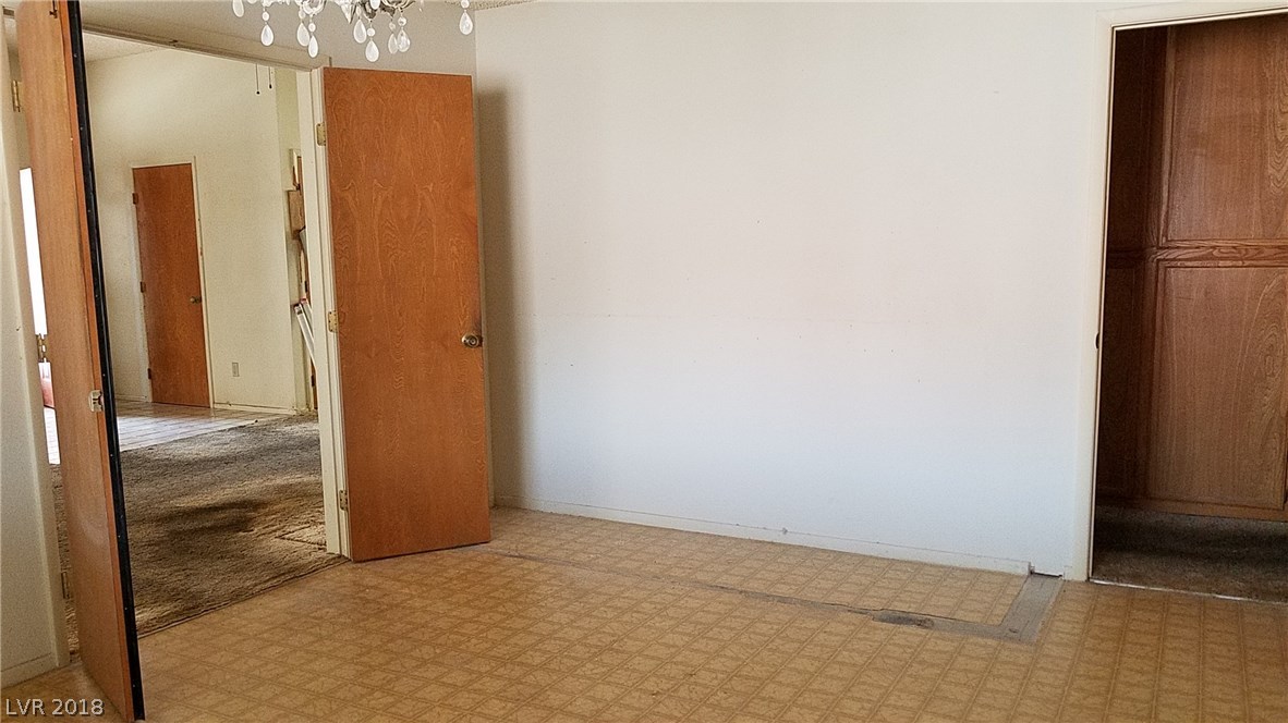 3rd bedroom with footprint of closet that has been removed
