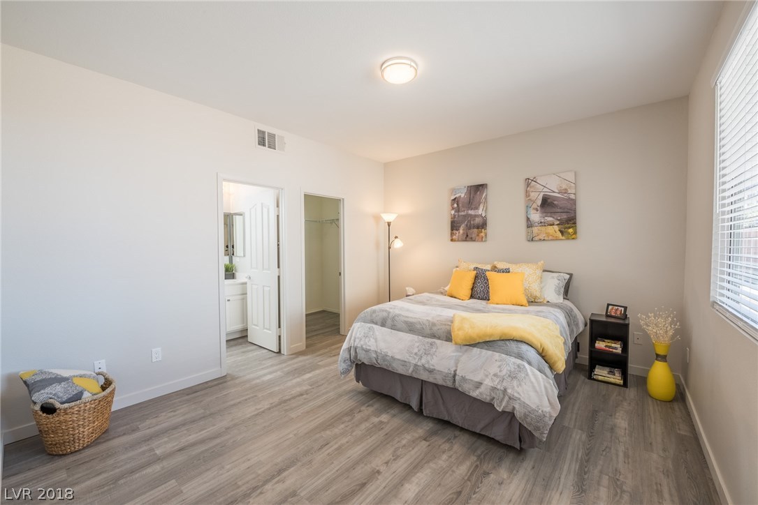 2nd master located downstairs, is perfect for guests or to accommodate anyone who would love a large bedroom, walk-in closet & on-suite full bathroom.  This is a private bathroom as there is an additional 1/2 bath located in the downstairs hallway.